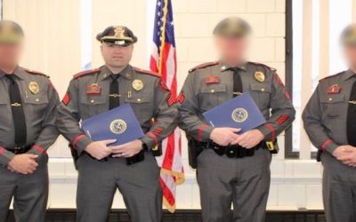 Oficial policía East Providence acusado de agresión ha sido suspendido.