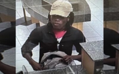 Policía Cranston busca sospechoso en asalto banco.