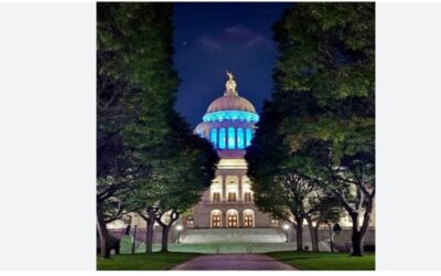 La Casa del Estado de Rhode Island se ilumina de verde azulado en honor al centenario del Hospital Miriam.