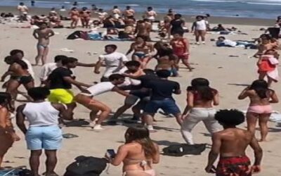 Disturbio en Second Beach deja 1 policía herido y 9 arrestados.