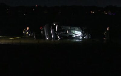 Equipos rescate sacan SUV sumergida en aguas de Conmicut Point